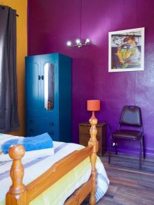 Ένα ή περισσότερα κρεβάτια σε δωμάτιο στο Hostal Maison de la Mer