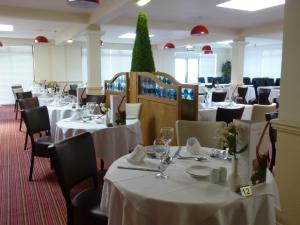 Reštaurácia alebo iné gastronomické zariadenie v ubytovaní The Norfolk Lodge Hotel