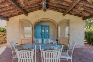 A patio or other outdoor area at Villa Agazzi by PosarelliVillas