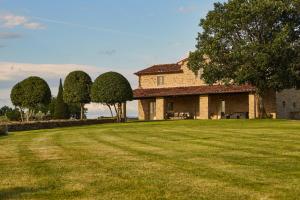 A garden outside Villa Agazzi by PosarelliVillas