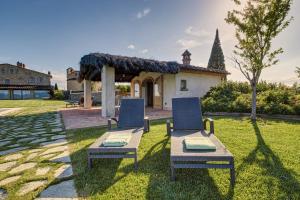 A garden outside Villa Agazzi by PosarelliVillas