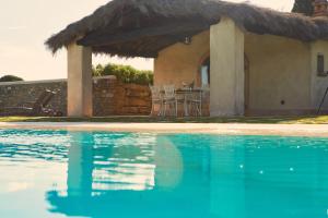 The swimming pool at or close to Villa Agazzi by PosarelliVillas