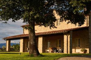 A garden outside Villa Agazzi by PosarelliVillas