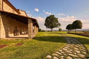 A garden outside Villa Agazzi by PosarelliVillas