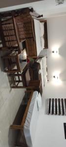 an overhead view of a room with two beds at Riyanhouse in Pūrnānkuppam