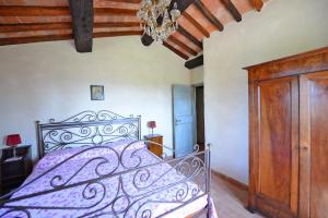A bed or beds in a room at Villa Agazzi by PosarelliVillas