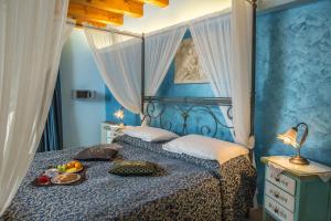 Posteľ alebo postele v izbe v ubytovaní Agriturismo dei Grippi