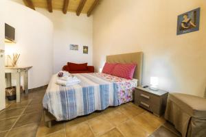 A bed or beds in a room at Antico Mercato