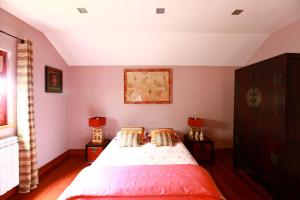 Uma cama ou camas num quarto em Casa Ci