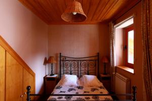 Uma cama ou camas num quarto em Casa Ci