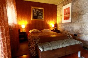 Uma cama ou camas num quarto em Casa Ci