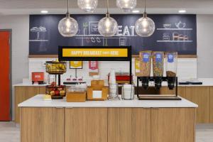 a food counter in a restaurant with food items at Hampton Inn & Suites McAllen in McAllen +44 photos