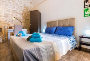 A bed or beds in a room at Antico Mercato