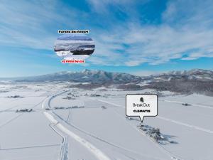 an aerial view of a highway in the snow at Clematis in Nakafurano +124 photos