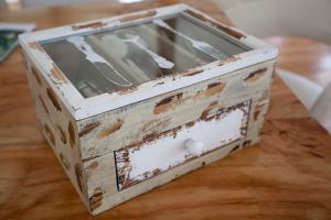 a wooden box sitting on top of a wooden table at Mareas Ralun Lodge in Ralún