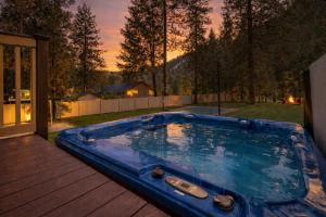 a large blue tub sitting on a deck at Recharge by The River by NW Comfy Cabins in Leavenworth