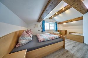 a bedroom with a bed in a room at Apartment Wenger Leogang in Leogang
