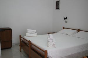 Postel nebo postele na pokoji v ubytování Hotel Europa