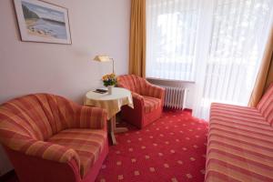 Ein Sitzbereich in der Unterkunft Mein Vierjahreszeiten Hotel Garni Superior