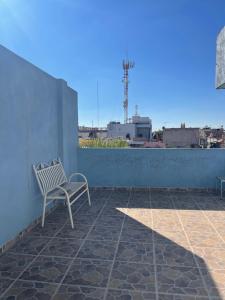 a bench sitting on the roof of a building at Camino de la Plata Hotel in Fresnillo de González Echeverría