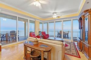 a living room with a couch and a table at La Playa 1001 in Perdido Key