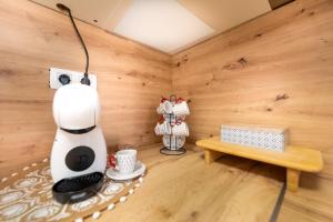 a kitchen with a coffee machine in a room at Oasis in Costa Calma