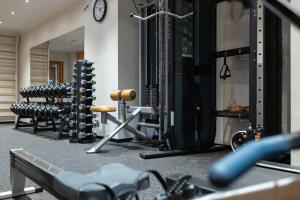a gym with a bunch of equipment in it at Hestia Hotel Ilmarine in Tallinn