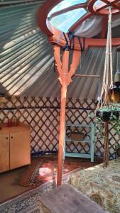 a room with a yurt with a ceiling at Arkeo - Luxury tents and cabins at the river in Nonceveux