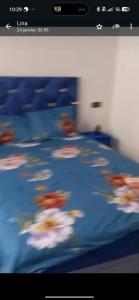 a blurry picture of a bed in a room at Jawhara zarka in Saïdia +4 photos