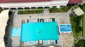 an overhead view of a swimming pool at a resort at Ngao #220 Swara Ranch in Nanyuki