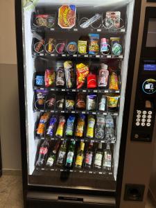 a refrigerator filled with lots of food and drinks at DH Hotel Deutsches Haus Mittweida - Ihr digitales Hotel in Mittweida