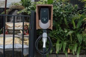 a electricity meter next to a gate with a statue at Sini Vie Resort & Spa Seminyak by Ini Vie Hospitality in Seminyak