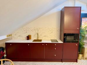 a kitchen with a sink and a counter at Hylton House in Birmingham