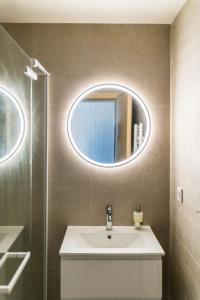 a bathroom with a sink and a mirror at Zastávka Vlkov in Vlkov +88 photos
