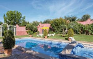 a swimming pool in the yard of a house at Villa Rocio in Setenil