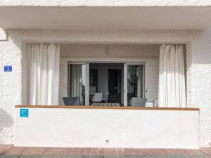 a view of the front porch of a house at Villa Gavines down in S'Algar