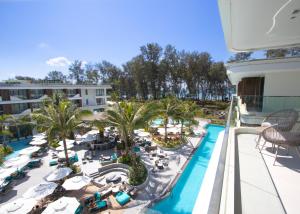 an aerial view of the pool at the resort at Beachfront 267 3BR Condo with Pool View in Phuket