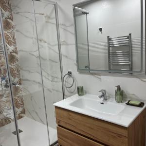 a bathroom with a sink and a shower at La Casa Vella in Navarcles +80 photos