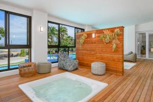 a room with a jacuzzi tub in a house at San Lameer Villa 2027 - 2 Bedroom Superior - 4 pax - San Lameer Rental Agency in Southbroom