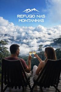 a man and woman sitting in chairs drinking wine at Chalés Refúgio nas montanhas in Guaratuba +63 photos