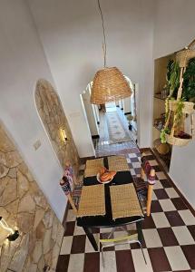 an overhead view of a room with a checkerboard floor at CHÂTELET Ouarzazate in Tabount