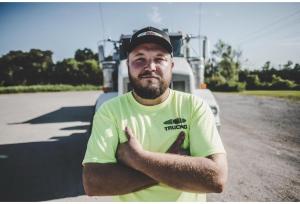 a man is standing in front of a truck at Studio 6-Bryan, TX - University Area in Bryan
