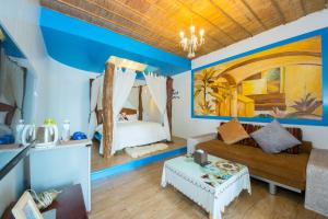 A bed or beds in a room at Blissful Star