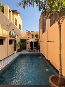 a swimming pool in the middle of a building at The Solo House in Jodhpur