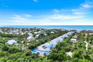 an aerial view of the resort with the ocean in the background at Seashells #45 in Sanibel