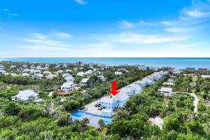 an aerial view of a resort with the ocean in the background at Seashells #45 in Sanibel +16 photos
