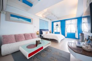A bed or beds in a room at Blissful Star