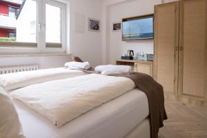 Llit o llits en una habitació de Hotel Klippenklang
