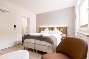 Llit o llits en una habitació de Hotel Klippenklang