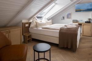 Llit o llits en una habitació de Hotel Klippenklang 10 fotos més